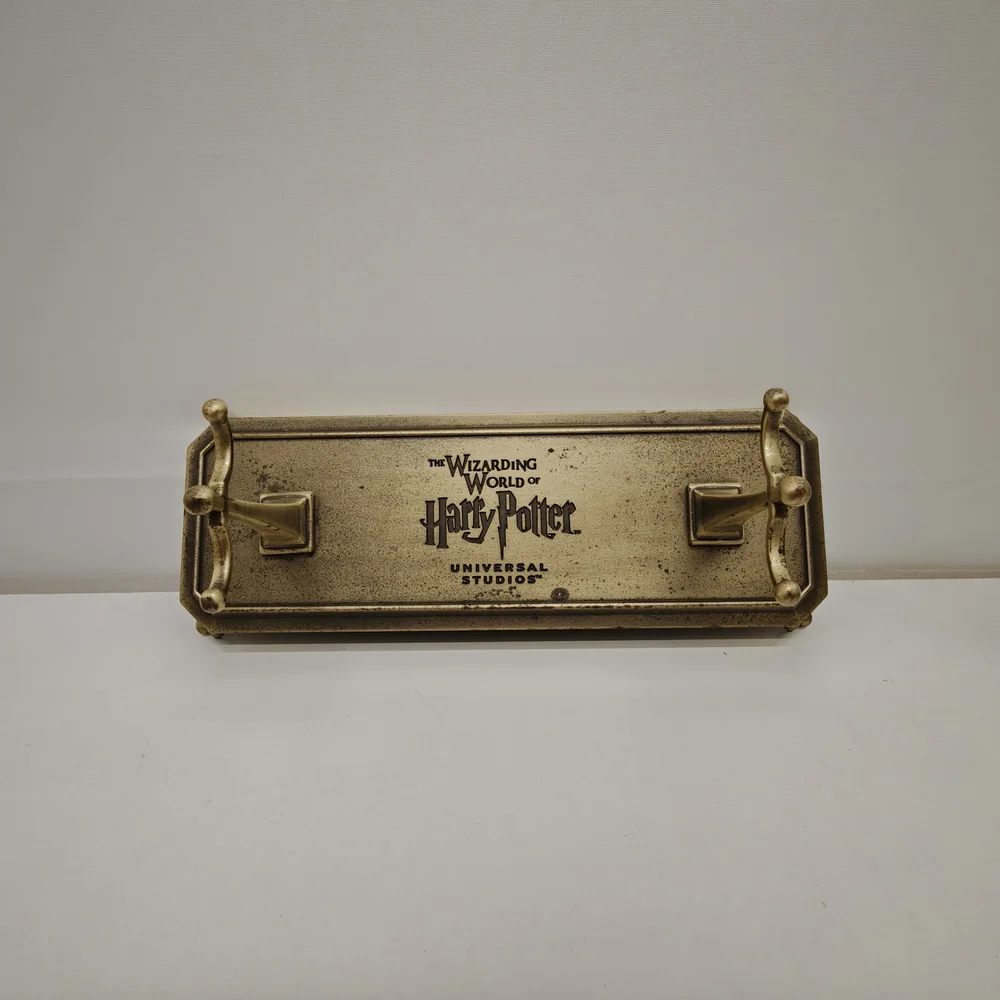 The Wizarding World of Harry Potter Gold Wall Hook Rack - Universal Studios